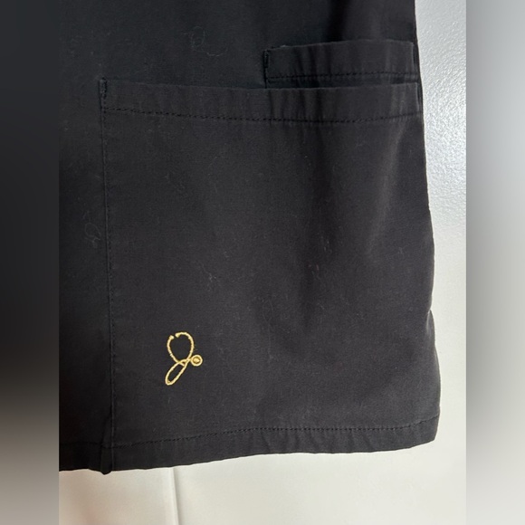 Jaanuu V-Neck Scrub Top with Cap Sleeves - Picture 3 of 8